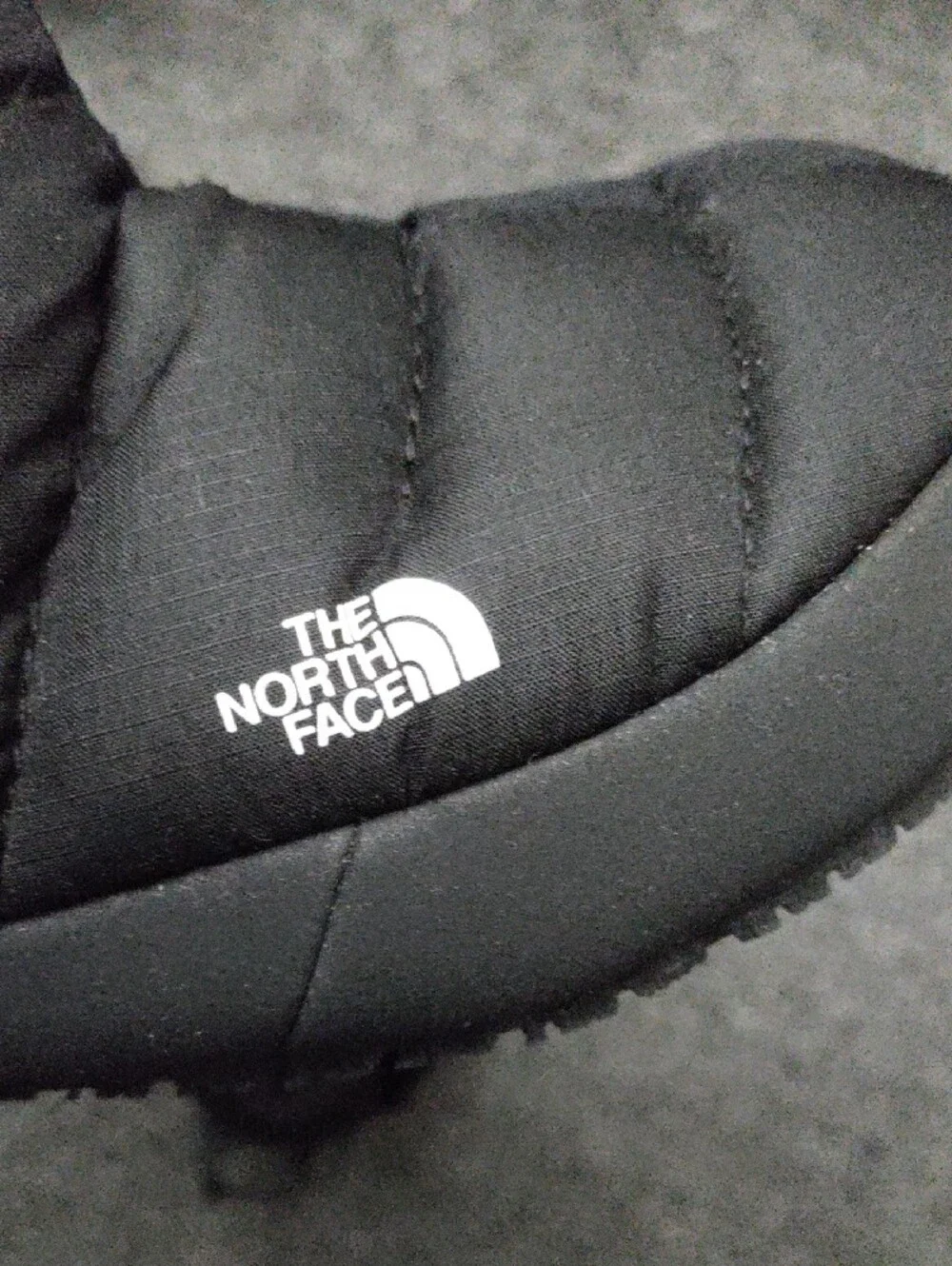 The North Face Kids Black Puffy Slip-On Slippers